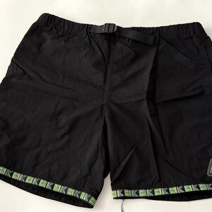 HUF Black Mesh Shorts with Neon Green Tag